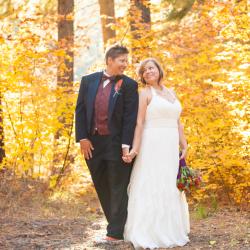 Couple in the bright yellow forest